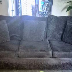 XL couch, XL love seat, couches, coffee table, and wall table set.