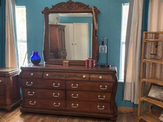 Wood Dresser with Mirror and Carved Detail