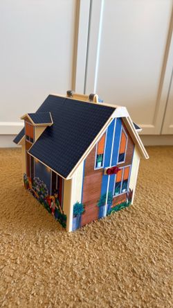 Playmobil Take Along Dollhouse with furniture, accessories, pet dog and a baby.