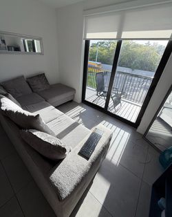 Grey Sectional Sofa with Chaise and Storage Ottoman