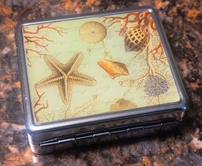 VINTAGE SHELLS STAINLESS STEEL PILL BOX B/O