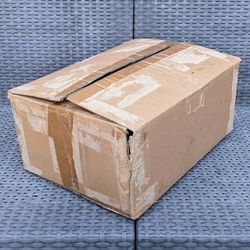 Clean medium size cardboard box with foam peanuts for shipping moving or storage