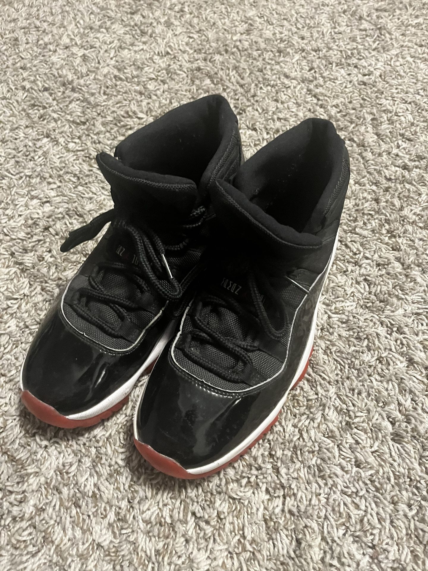 Size 10 Air Jordan 11 “Bred”