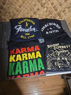 Lot of 4 sz  XL tees for adults good condition