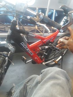 Red and black full suspension mountain bike