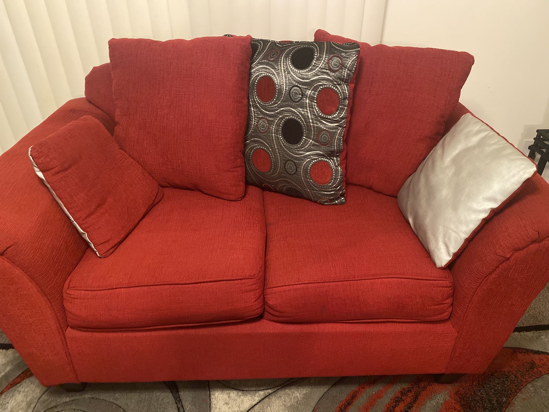 Red Sofa And Love Seat With Pillows