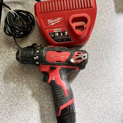 Milwaukee M12 Drill Battery And Charger 
