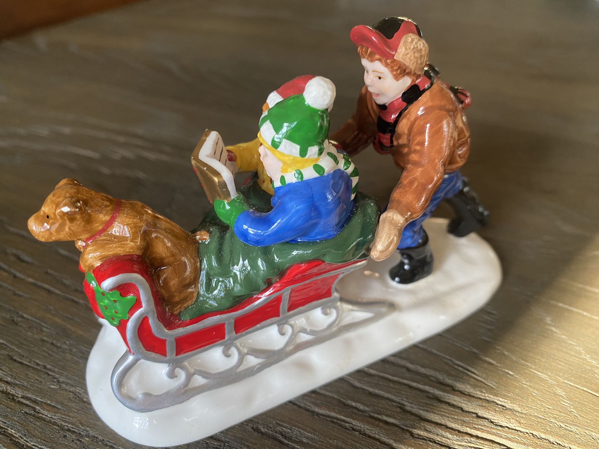 Department 56 Caroling Through The Snow – Snow Village Figurine