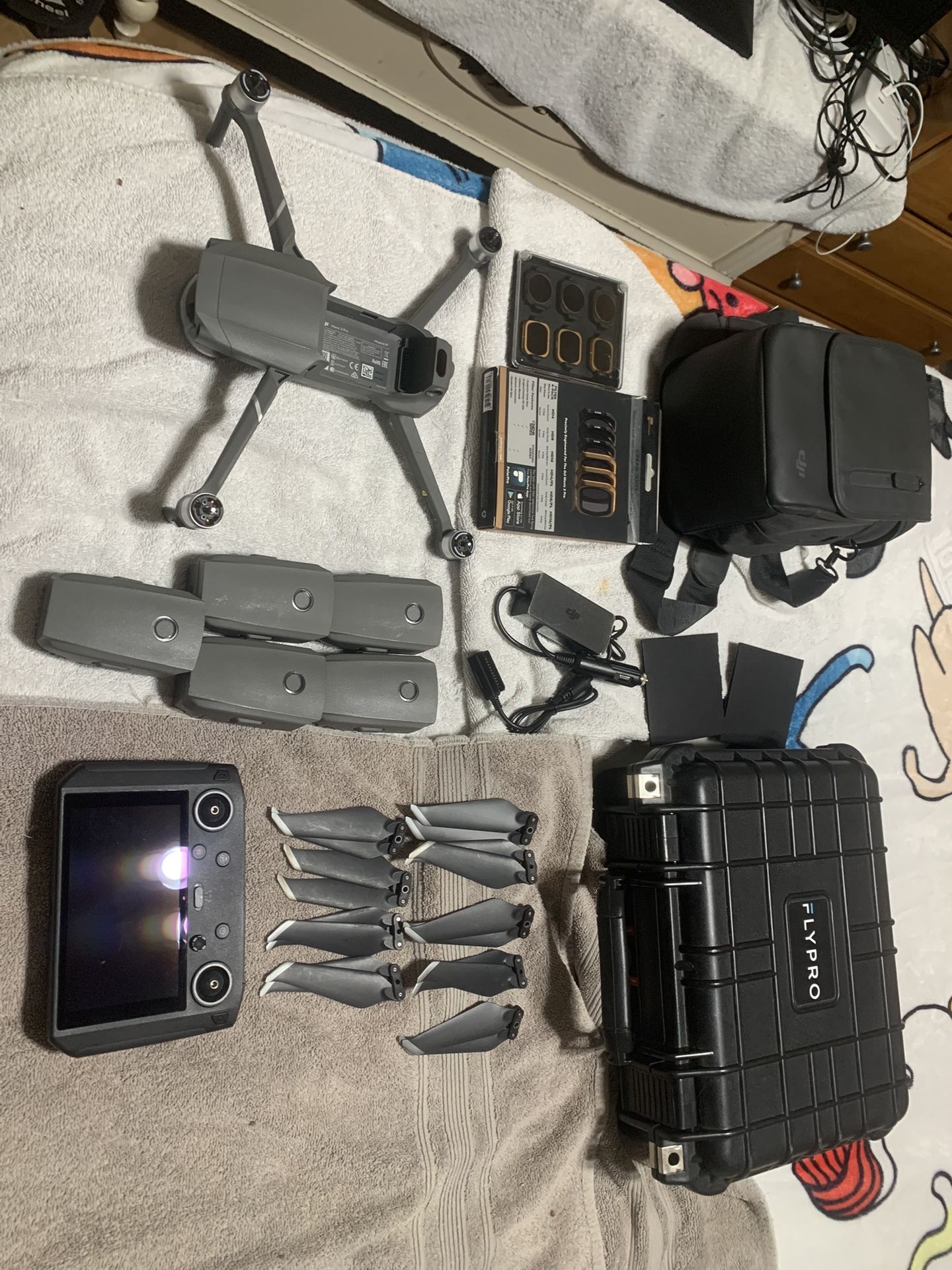 DJI Mavic 2 Pro Drone Bundle: Smart Controller, FlyPro Charging Case, & Extras