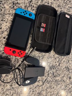 Nintendo Switch with accessories & 2 games