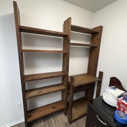 Solid wood modular shelving unit with a desk section