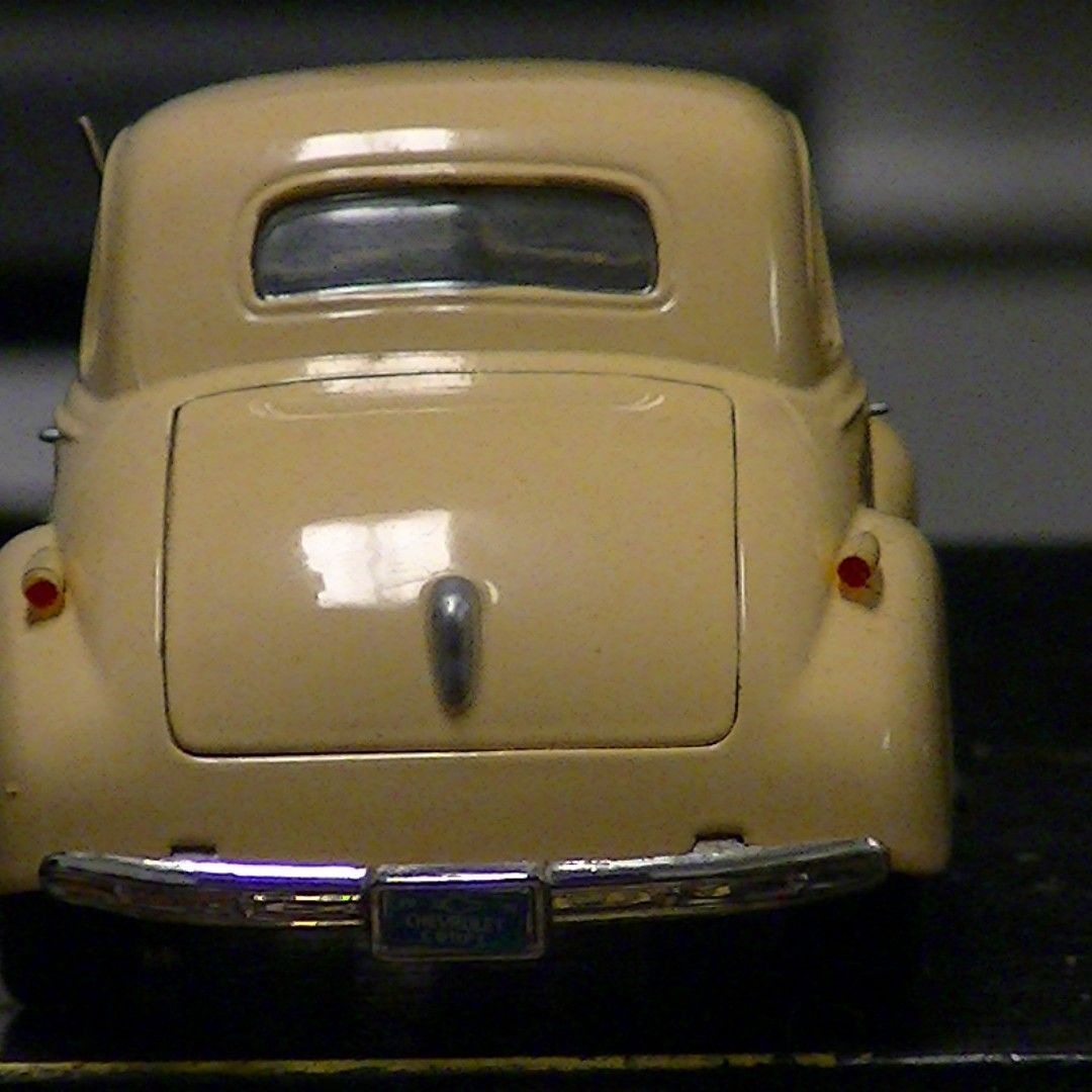 Vintage Cream Colored Model Car