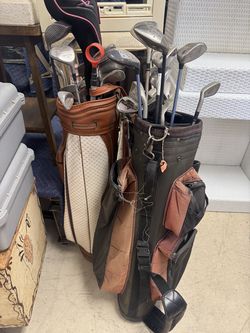 Pair of men’s & women’s golf clubs
