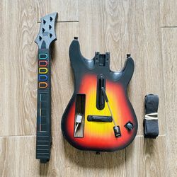 Nintendo Wii Guitar Hero Wireless Sunburst Guitar Controller RedOctane 95455.805. With shoulder strap and fully tested. Great condition and well maint