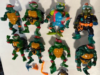 Vintage TMNT (Teenage Mutant Ninja Turtles) action figure lot featuring 8 large +1mini