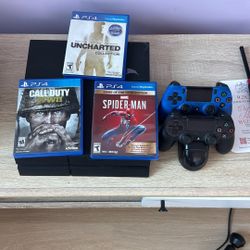 Sony PlayStation 4 PS4 Slim With 2 Controllers, Charging Dock, And 6 Games!