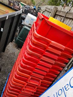 Large pile of recycling bins