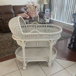Wicker Bassinet with wheels (bed detachable and lays flat)