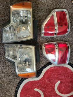 Original headlight and tail light assembly 100