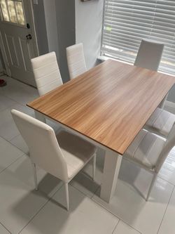 Dinner table of 4 chairs I can deliver for extra fee