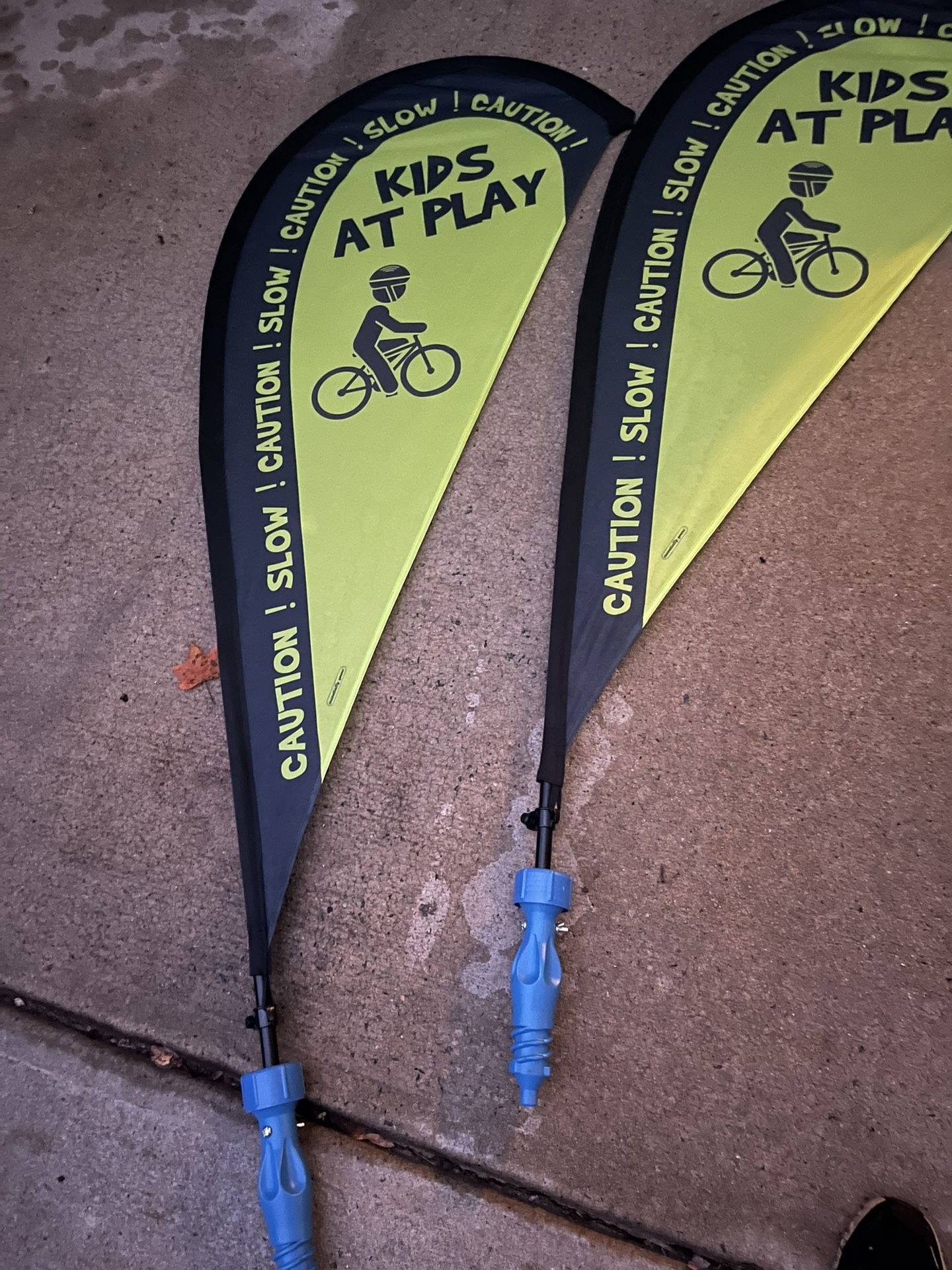 Kids at play caution sign pair