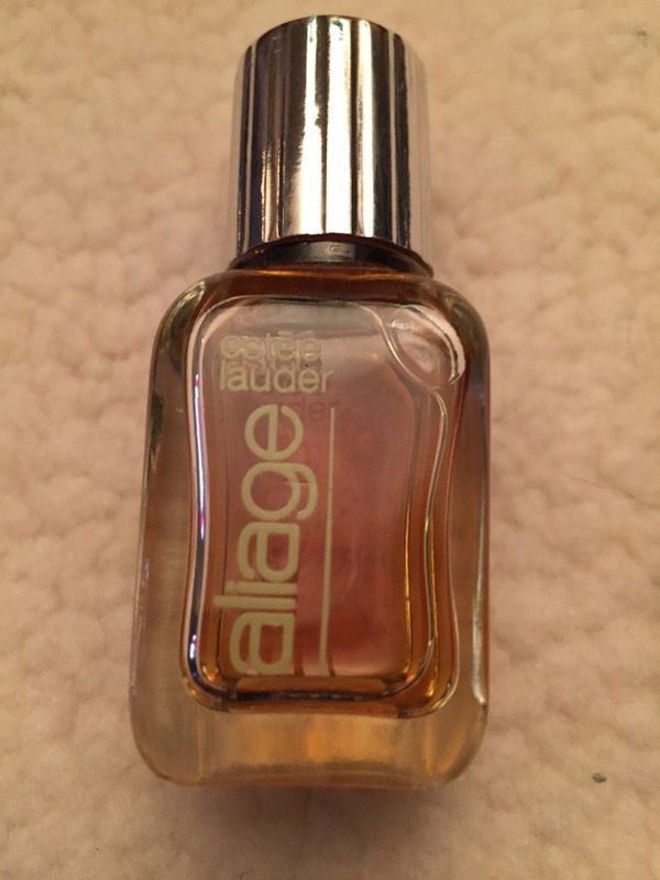 Estee lauder alliage 1/2 oz sport fragrance mini bottle. 3” x1”. Fragrane is dark and probably “turned” but mint and rare circa 1980’s