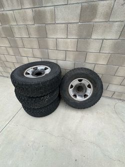 Set of 4 All-Terrain Truck Tires on Steel Wheels