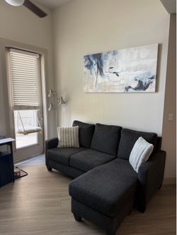 Sofa with reversible Chaise - center fold down.