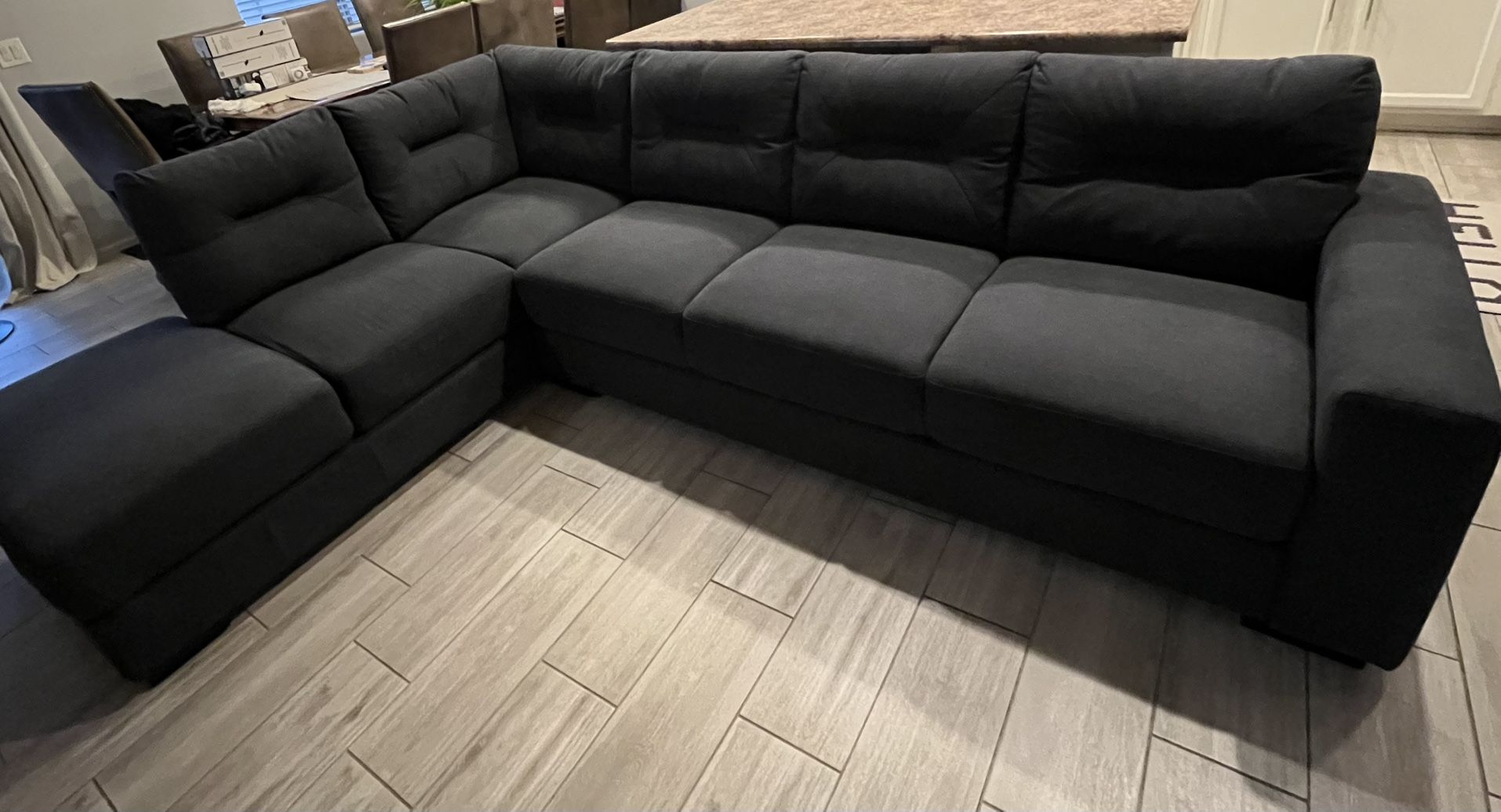 Living Spaces Sectional Sofa. Purchased seven months ago.