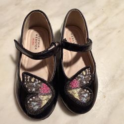 These are Sophia Webster Mini patent leather butterfly Mary Jane flats with colorful embroidered butterfly wings on the toe.  