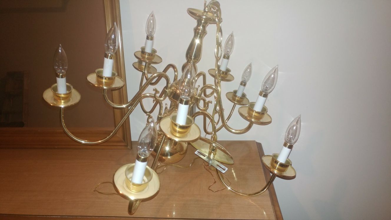 This is cleaning sale, chandeliers with bulbs clean no scratches. Perfect for bedroom and hall. Looks great in a hall