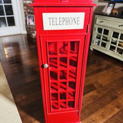 London telephone booth-style display cabinet or bookshelf.  