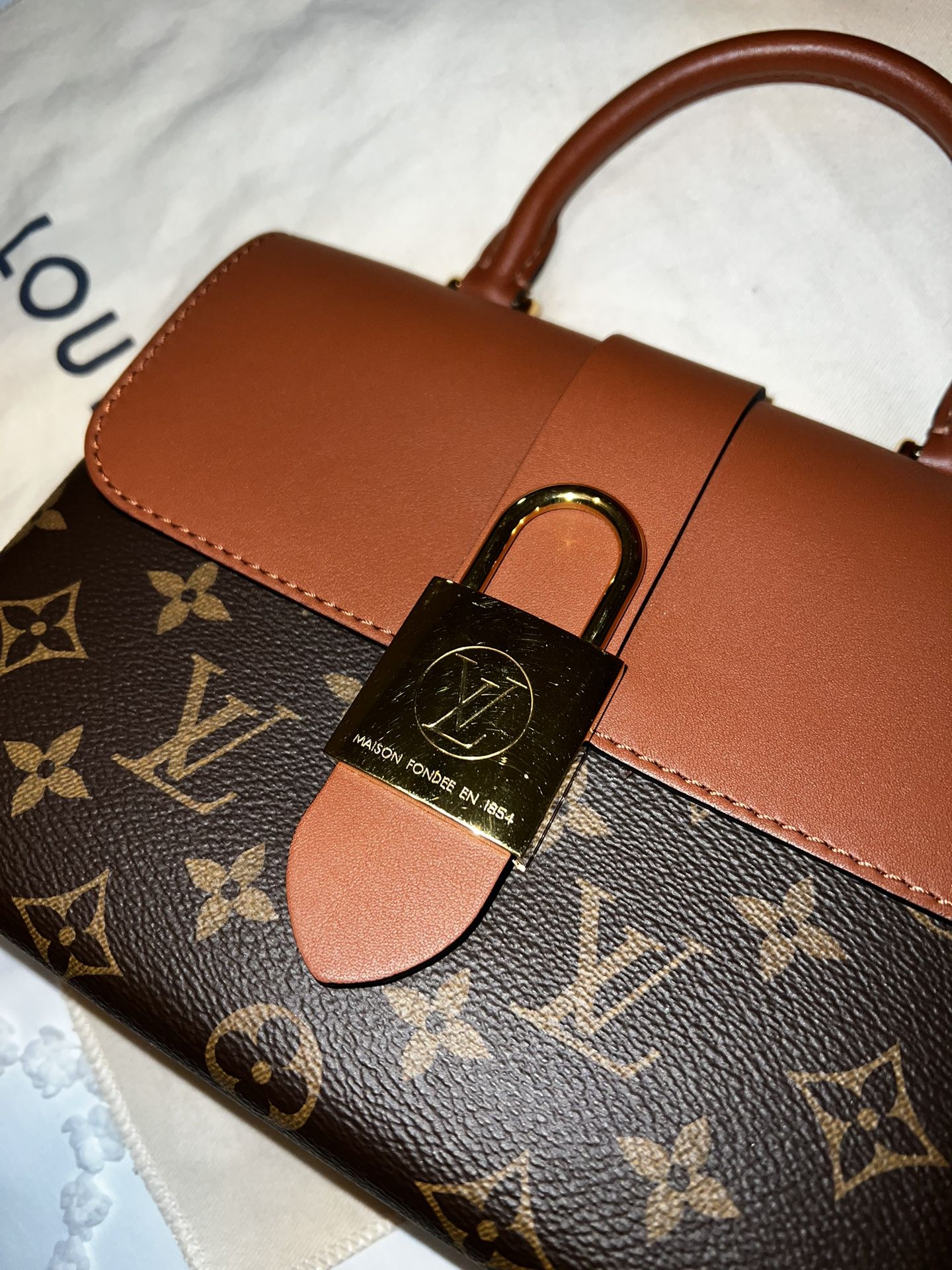 Authentic near new Louis Vuitton Locky BB handbag with original