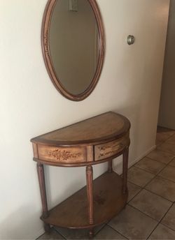 Entry table and mirror