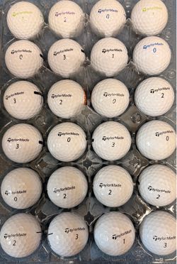24 Like New TaylorMade Golf Balls As Pictured ———