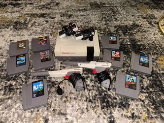 As-Is Nintendo NES Console, 2 Controllers, 2 Zappers & 9 Games - Untested Lot