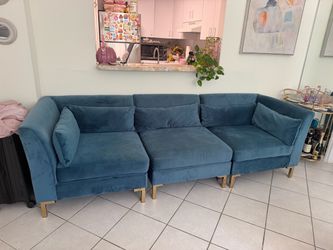 Blue velvet sofa
