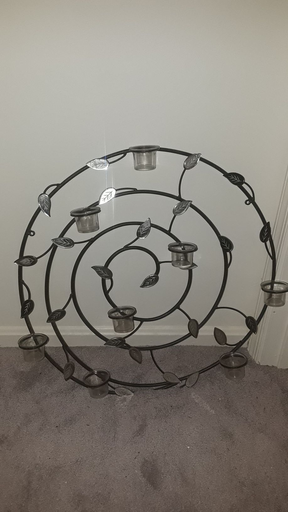 Iron spiral sconce with tea lights