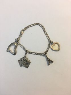 Charm bracelet with silver charms