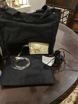 Breast pump and bottle warmer