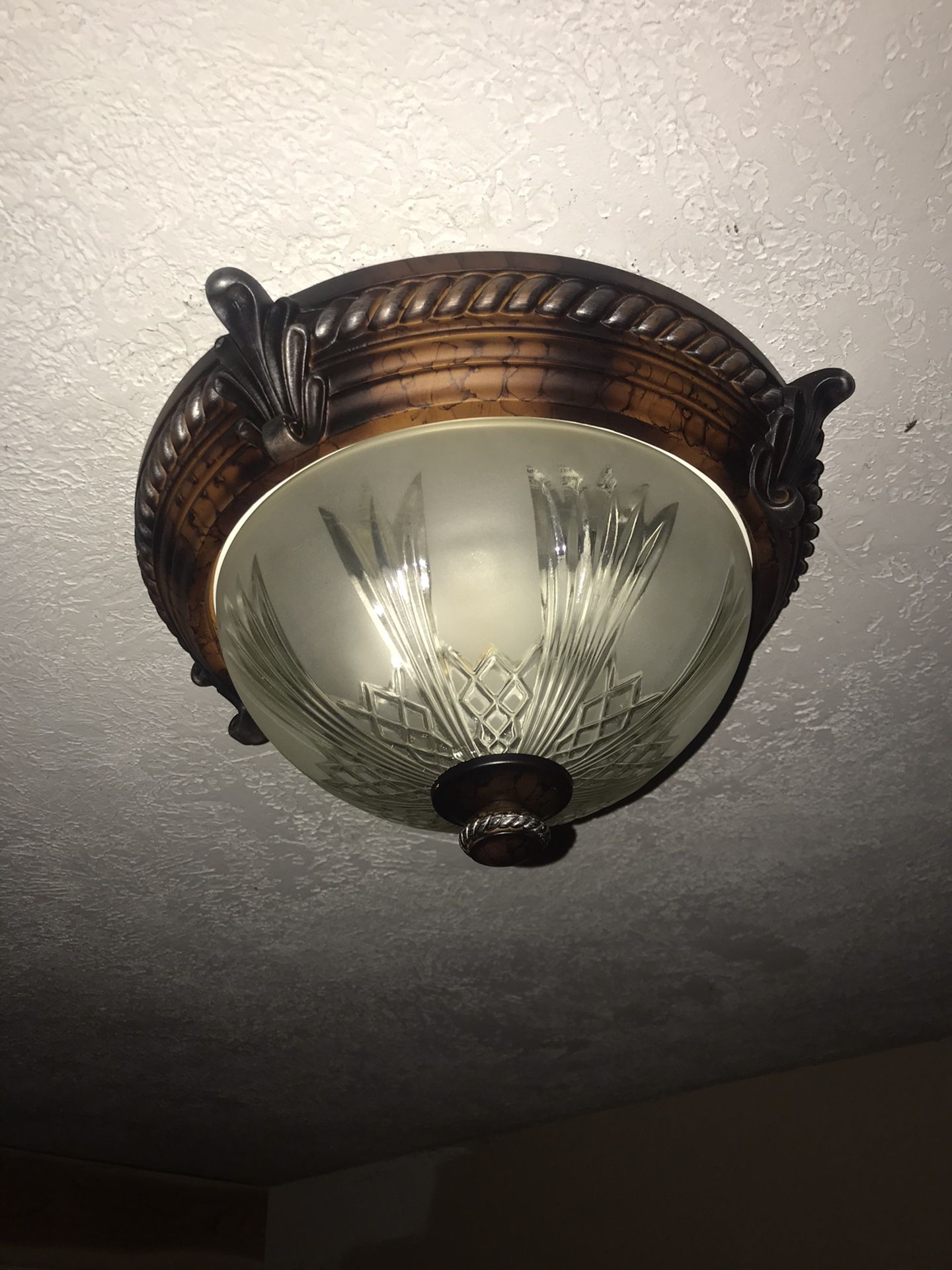 Western style flush mount light. Works great!