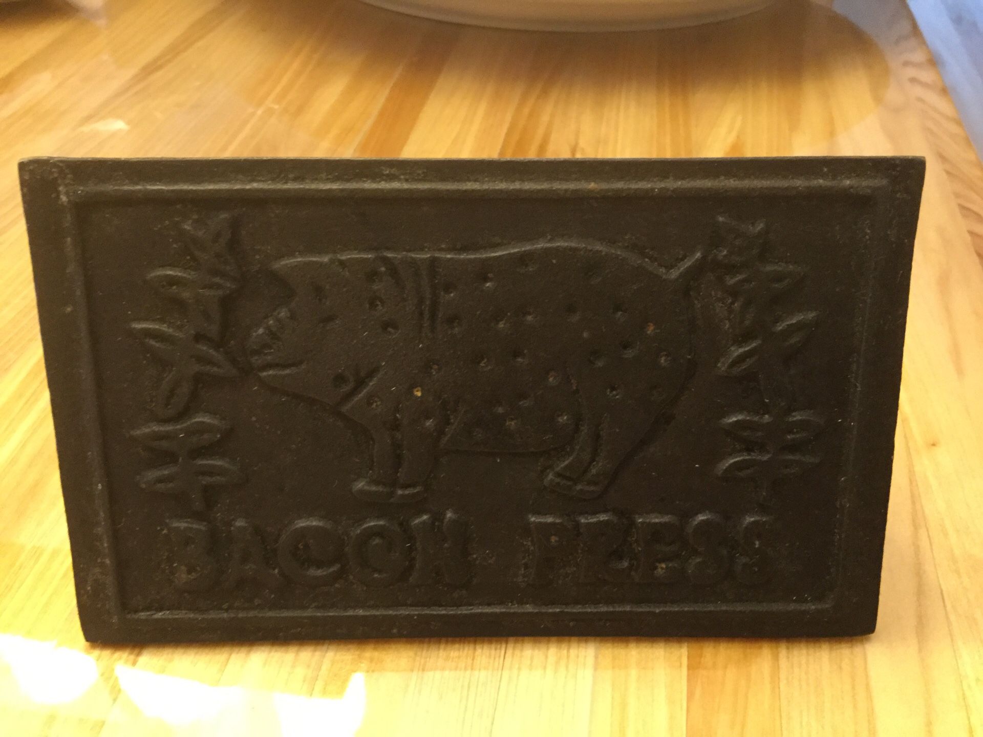 Cast iron bacon press
