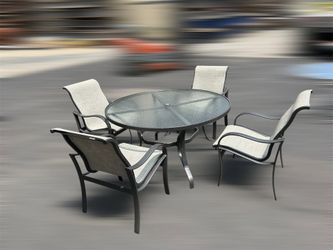 Tropitone patio set from Cabin House (Table and 4 chairs)
