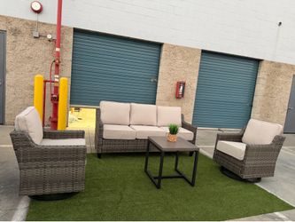 4-Piece Wicker Outdoor Patio Set with Sofa, Swivel Chairs, and Table