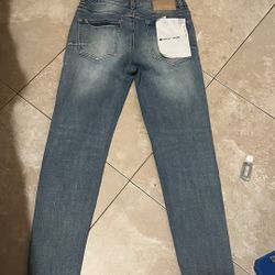 Purple jeans size 28 missing front tag other than that nothing is wrong with it 