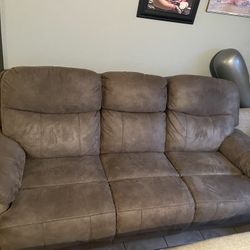 One Grey Recliner