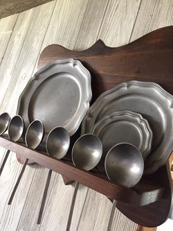 Pewter dish and spoon display rack (medieval)