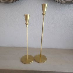 2 gold toned candle sticks