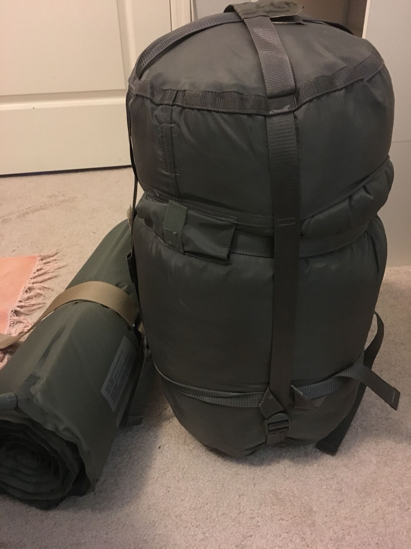 Military sleeping bag and inflatable pad