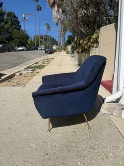 Midnight blue velvet chair • brass legs